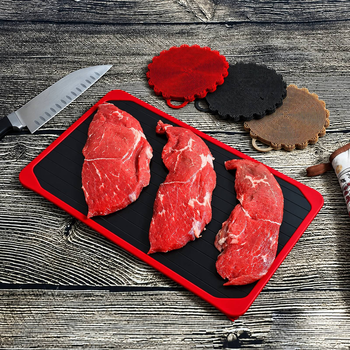 Black aluminum defrosting tray with food